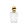 Mini garrafa de vidro lapidado transparente vintage, 15,5cm de altura, com tampa de metal para decorar ou servir.