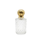 Mini garrafa de vidro lapidado transparente vintage, 15,5cm de altura, com tampa de metal para decorar ou servir.