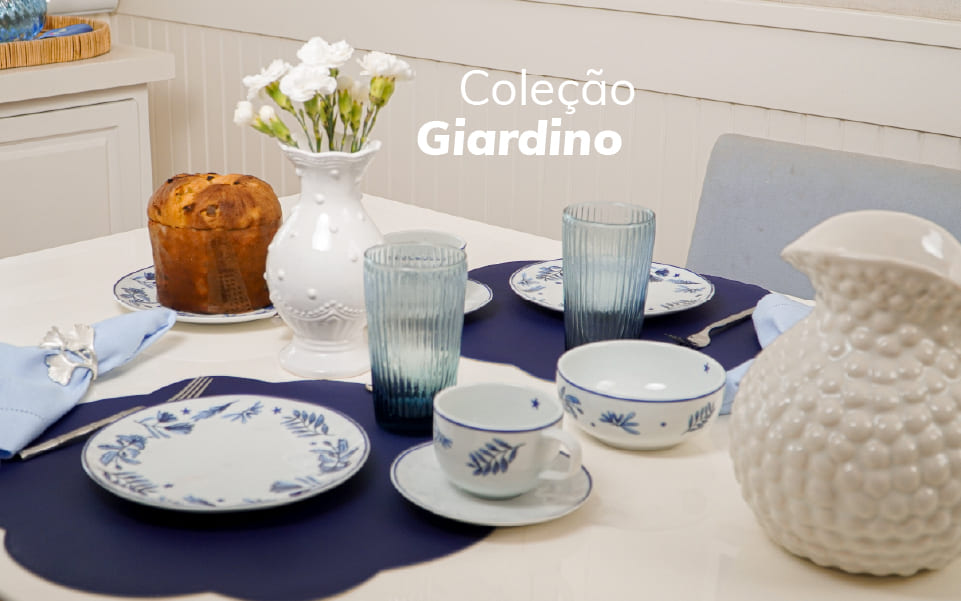 Uma mesa posta completa com a colecao giardino